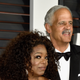 Oprah Winfrey (L) and businessman Stedman Graham attend the 2015 Vanity Fair Oscar Party on February 22, 2015, in Beverly Hills, California.